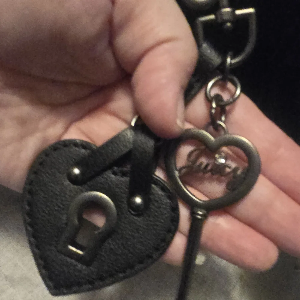 Juicy Couture Black Tote Royal Licorice with Heart Charm and Crest